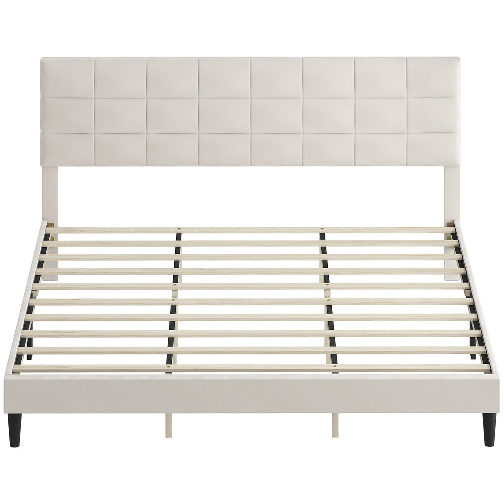 Cream king size platform bed with upholstered headboard and wood slats