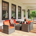 Affordable 4-piece outdoor wicker patio furniture conversation set with beige cushions