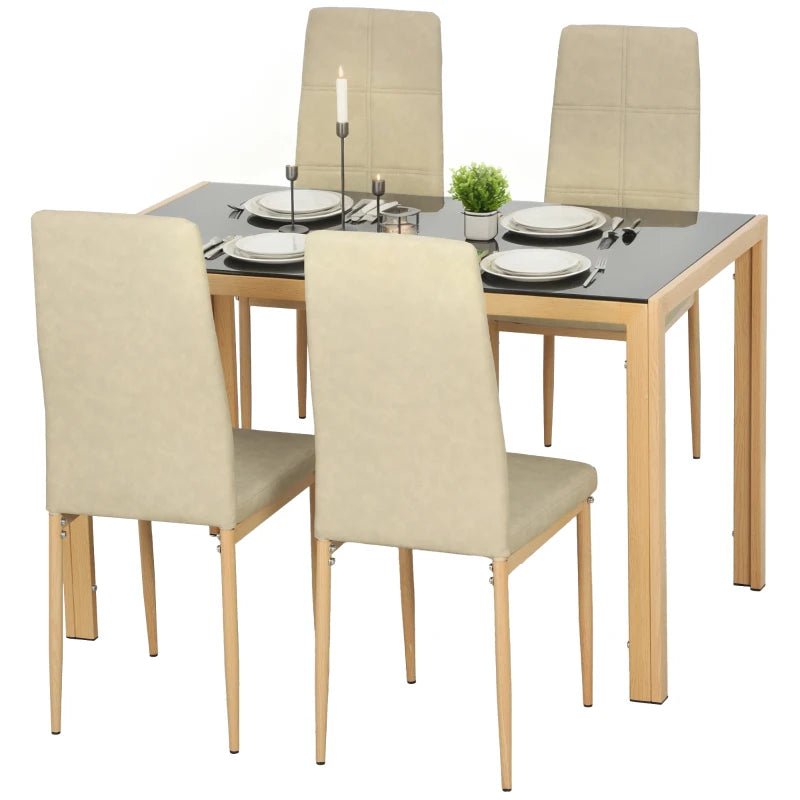 Modern glass dining table with faux leather chairs and metal frame